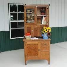 The period of manufacture for hoosier cabinets begins before 1900 and lasts till the 2nd world war, a period of approx. Small Hoosier Style Cabinet Made By Boone Dressed Up With Vintage Yellow Ware And Graniteware Yellow Furniture Yellow Kitchen Decor Shabby Chic Furniture