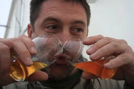 Patrick samples the beer