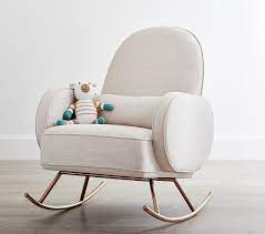 The nursery glider that has everything a modern mom would want. Nursery Works Compass Modern Rocking Chair Pottery Barn Kids