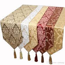 Christmas red table dining kitchen runners 13x70 inch classic coffee folding table runner decorate fringe jingle bells floral 4pcs set place mats for. Decorating Fabric Table Runner With Tassels Gorgeous Imitation Leather Table Runners Tablecloth From Linktone 22 04 Dhgate Com Party Table Cloth Fabric Table Runner Christmas Table Cloth