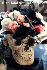 I added a little bit of fern as an accent, to offset all that pink. Diy Floral Skull Centerpiece Giggles Galore