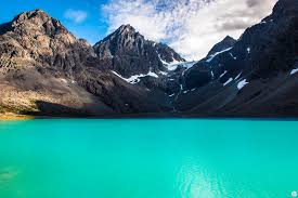The trip involves driving the e8 and rv91 to in summer the mountains are illuminated by the warm glow of the midnight sun, and the fjords'. Hike To The Blue Lake Blaisvatnet In Lyngen Alps Northern Norway