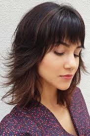 This short haircut for ladies with thick natural curls is shaped in a style that closely resembles the mohawk. 55 Stylish Layered Bob Hairstyles Lovehairstyles Com
