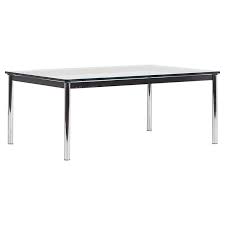 Oblong openings on the two main sides make it easy to move the stool, which can be positioned horizontally or vertically. Le Corbusier Ch Perriand And Pierre Jeanneret Lc10 P Coffee Table For Cassina At 1stdibs