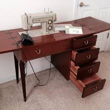 Useful also as sewing machine cabinet and sewing desk. Kenmore Sewing Machine Cabinet
