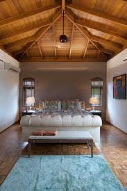 For these designs, the center of the ceiling is several inches to multiple feet higher than the ceiling near the perimeter of the room. 6 High And Mighty Wooden Ceiling Designs