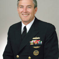 Rear Admiral (lower half) Ralph M. Mitchell Jr., USN selectee (uncovered)