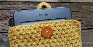 You are able to access this free knitting pattern for this lovely cardigan at knitty's website. Knitted Kindle Cover Savlabot