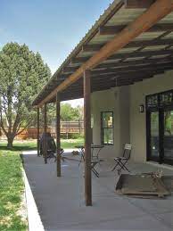 Steel body frame in hammertone bronze powder coated. Shade Structures Rusted Steel Support Beams Covered Patio Design Building A Patio Patio Shade