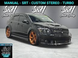 Image result for Bright Silver 2009 Caliber