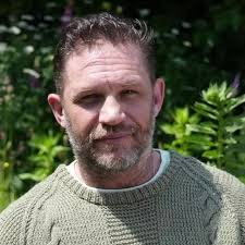 The olive green sweater worn by Tom Hardy