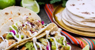 You quickly dip fish in a beer flour bath, then. Baja Style Fish Tacos With Southwestern Slaw