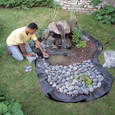 Do it yourself outdoor water fountain designs. How To Build A Low Maintenance Water Feature Diy Family Handyman