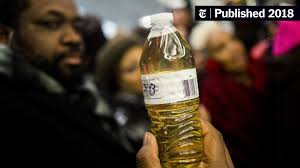 Two Views of Flint's Water Troubles: One a Close-Up and One With a  Wide-Angle Lens