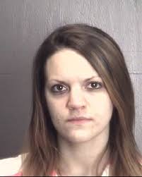 Two women charged in armed robbery