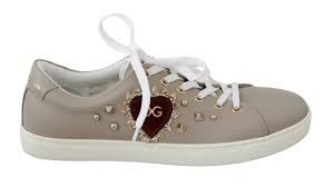 You will also see logos that are plain text logos, but with a twist, that hints that they are shoe brand. Beige Leather Gold Red Heart Womens Sneakers Shoes Brandsgateway