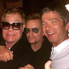 Noel Gallagher with Elton John and Bono