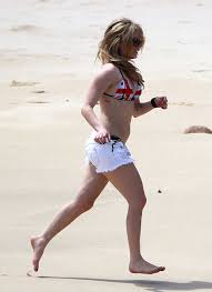 Avril Lavigne White Short 8x10 Picture Celebrity Print