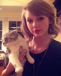 Today is #InternationalCatDay! 🐾🐱 — Shout out to Taylor Swift's cats Olivia,  Benjamin, and Meredith. Which one is your favorite? 😻