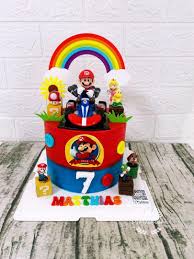 To make the hat, cut a crescent shape out of the other round cake. Super Mario Birthday Cake Food Drinks Homemade Bakes On Carousell