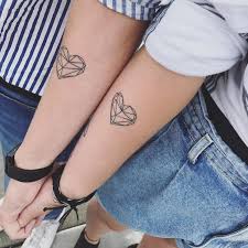 When standing together, the half faces make a whole, symbolizing their completeness. Love Marriage Tattoos Couple Tattoos 50 Awesome Ideas You Ll Want To Ink Unique Wedding Ideas Inked Weddings Blog