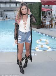 If the cowboy boots are mostly unadorned and more workaday in style, i'd suggest you get a pair of classic levi's 501s jeans with a bootcut leg, that will fit over the shaft of the boot and give i prefer boot cut to wear with my cowboy boots. Outfits With Cowboy Boots 19 Ways To Wear Cowboy Shoes