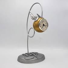 Usually, the main goal of alarm clocks is to awaken people from their night's sleep, but they can also be used also as a reminding tool. This 2001 Hallmark Rare Harry Potter Quidditch Flying Golden Snitch Desk Clock Was Just Added To Our Online Inventory Harry Potter Quidditch Ebay Finds Ebay