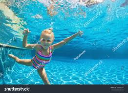 Funny Portrait Of Child Learn Swimming Diving In Blue Pool With Fun Jumping Deep Down Underwater With Kids Swimming Swimming Diving Water Sports Activities