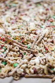 White trash, lovingly placed into a clear plastic treat bag and tied with holiday ribbon is hit every time. Christmas Trash Snack Mix