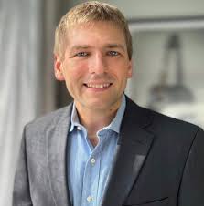 Behind Forbes 30 Under 30: Travis May