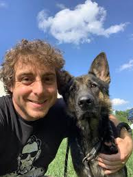 A man and his new dog! Going home today is precious boy Dixon!