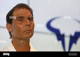 Manacor, Spain. 18th May, 2023. Maria Isabel Nadal (l-r), sister of Rafa  Nadal, Francisca Perello, wife of Rafa Nadal, and Carlos Moya, tennis coach  of Rafa Nadal watch a press conference at