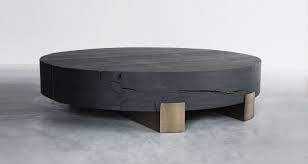 Round tables are easy to move around while square tables pair well with sectionals. Beam Limited Round Coffee Table Mu Wooden Design Blog Round Black Coffee Table Coffee Table Wood Coffee Table