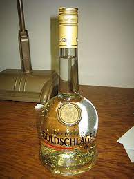 Goldschlager is a swiss cinnamon schnapps, a liqueur with very thin, yet flakes of gold floating in it. Goldschlager Wikipedia