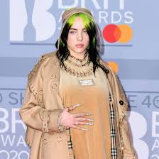 Billie eilish is known for wearing baggy, oversized clothes. Billie Eilish One Ups Her Logo Manicure With An Homage To Burberry Vogue