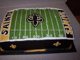 Spread reserved coconut frosting between layers of cake, forming the football. Coolest Football Cake Photos And Amazing How To Tips