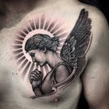 Tattoospedia Worlds Largest Tattoo Ideas And Designs Database Cool Chest Tattoos Chest Tattoo Men Guardian Angel Tattoo Designs