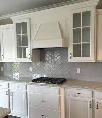 Amazing gallery of interior design and decorating ideas of herringbone kitchen backsplash in kitchens by elite interior designers. Desert Gray Subway 3x6 Gloss Finish In Herringbone Pattern Herringbone Backsplash Kitchen Kitchen Remodel Small White Kitchen Design