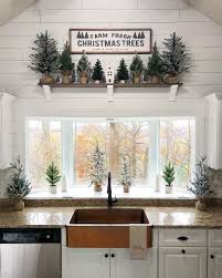 Chrissy On Instagram I Had This Mini Tree Farm Above The Sink Last Year So You Know I Had To B Farmhouse Christmas Tree Christmas Kitchen Farmhouse Christmas