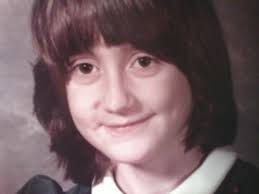 My moms family in Sevas before the genocide. My mom standing with white  dress.. little girl then