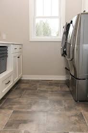 Dark Gray And Tan Tile Laundry Room Floor Tile Floor Herringbone Tile Floors Laundry Room Flooring