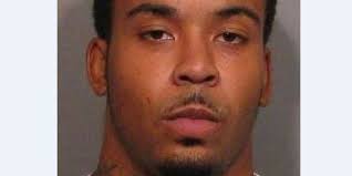 Suspect in custody in death of man found inside burning apartment