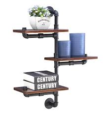Crafted with fashionable industrial flair, this elegant wall accent piece sports a bare metal pipe base. 3 Tier Vertical Floating Staggered Industrial Rustic Pipe Shelves Wall Mount Tiered Industrial Pipe Home Furniture Antique Metal Buy Industrial Pipe Wall Shelf Industrial Rustic Pipe Shelves Floating Staggered Industrial Rustic Pipe Shelves Product