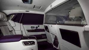 Think you can name a more luxurious car interior than the ghost? This Rolls Royce Phantom Has A Purple And White Interior With A Privacy Suite Carscoops