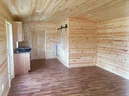 Windows provide for natural lighting, and a traditional style metal walk in door provides security and convenience. Beautiful Cabin Interior Perfect For A Tiny Home