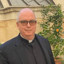 Monsignor Robert W. OLIVER