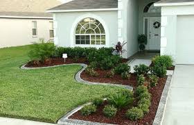 For small front yards, on dark landscaping stone or ground, some planters with succulents and white cedar or sedums look great. 20 Front Yard Landscaping Images Magzhouse