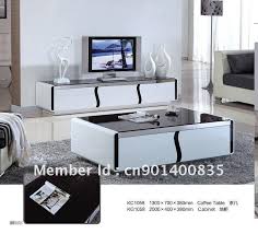 Gold/marble medium round marble coffee table set our round coffee table pairs natural white our round coffee table pairs natural white marble with gold legs for a glamorous look. 20 Photos Tv Unit And Coffee Table Sets Tv Cabinet And Stand Ideas Tv Stand And Coffee Table Set Tv Stand And Coffee Table Stylish Coffee Table