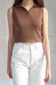 Free shipping for orders over $150! Hailie Knit Tank 22 In Stock Description Cropped Fit Knit Tank Top In Brown With A Mini Scallop Trim Collar Fabrics 100 Cotton Measurements 16 Length 15 Bust Made In China To Order This Product You Can Call Our Customer Service At 1 310 773 5405