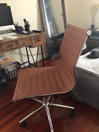 adjustable height mid back armless office ribbed chair on black base farmhouse table chairs leather office chair leather dining room chairs